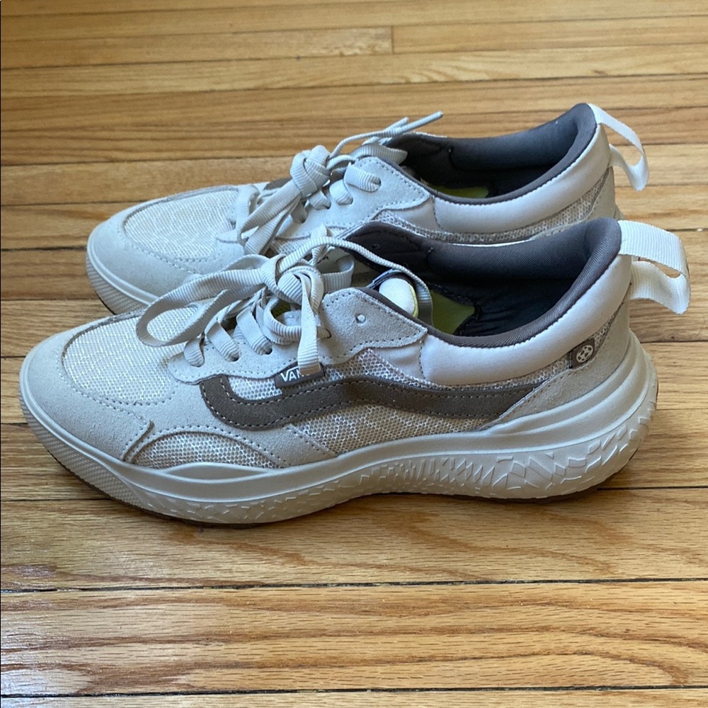 Vans Women's Sneakers in Cream and Gray.